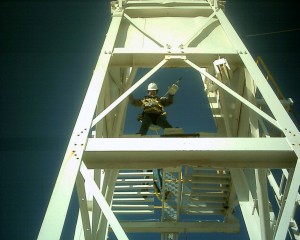 Debbie Solano on the Monkey Board During Derrick Hand Training at High Plains Technology Center
